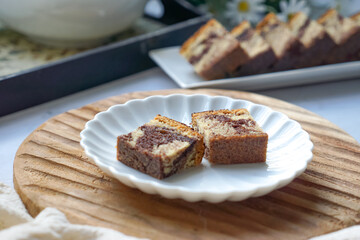 Slices of marble cake on white plates