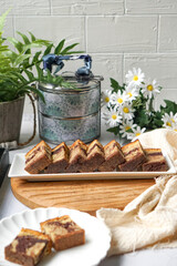 Slices of marble cake on white plates