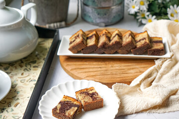 Slices of marble cake on white plates
