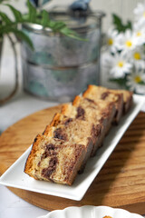 Slices of marble cake on white plates