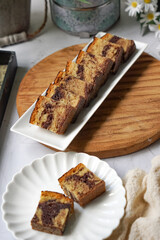 Slices of marble cake on white plates