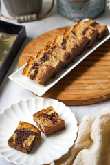 Slices of marble cake on white plates