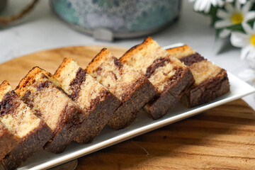 Slices of marble cake on white plates