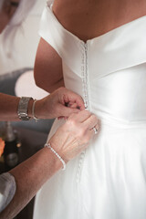 A bride getting her final adjustments 