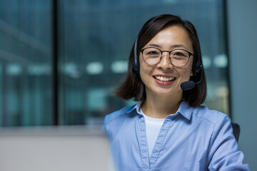 Asian woman professional with a headset working in customer service or sales support. A friendly and approachable demeanor conveys reliability and professionalism