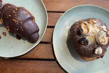 Gourmet vegan chocolate croissant and vegan s'mores donut