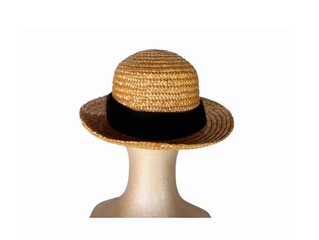 The white background in the picture is a brown hat woven from a type of dry grass that is tough and resistant to sunlight. It is detailed with beautiful patterns and has a black cloth in the middle.