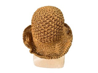 The white background in the picture is a brown hemp hat woven from a wide brim, intricately woven...