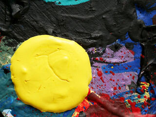 close-up detail of a painter's old used paint palette
