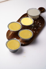 panna cotta in disposable containers. Tiramisu with different flavors