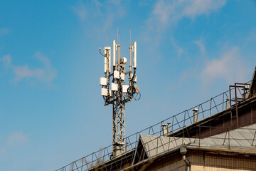 Antenna on the roof of the house with many radio transmitters. Antennas of communication in the...