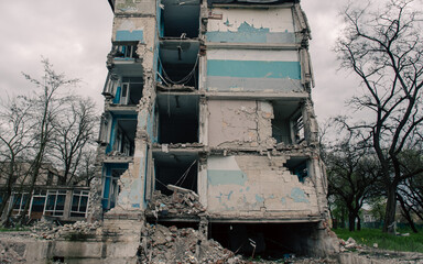 Fototapeta premium destroyed and burned houses in the city in Ukraine