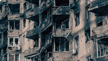 destroyed and burned houses in the city in Ukraine