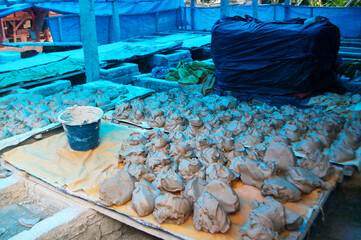 A lump of raw clay, ready to be transformed into a beautiful ceramic masterpiece