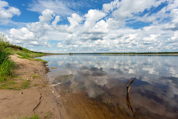 Summer landscape - Northern Dvina river under a cloudy sky