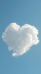 Soft, translucent, heart-shaped cumulus cloud against a clear blue sky, design element, summer, sky