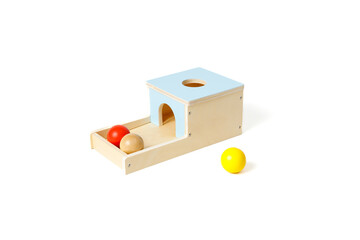 Educational logic colorful toy box with wooden balls isolated on white background.