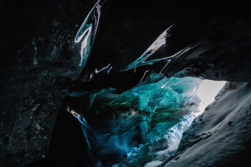 Ice cave: Entrance Near Bogdanovich Glacier, Tian Shan Mountains, Central Asia, Almaty, Kazakhstan's National Park, Zailiysky Alatau Natural Wonders.