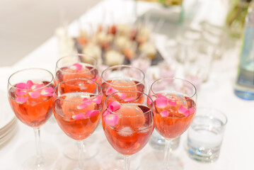 Alcohol in wine glasses at the party.