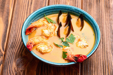French seafood bouillabaisse soup with shrimps and mussels photography . Top view