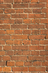 Old red brick wall texture. Background of a old brick house.