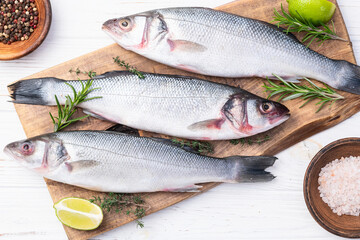 Raw sea bass fish photography . Top view