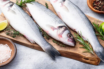 Raw sea bass fish photography . Top view