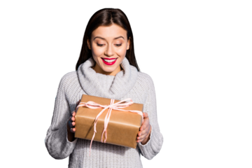 Portrait of charming lady getting present looking smiling wearing gray sweater isolated over blue background