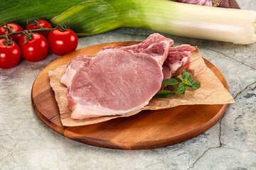 Raw pork steak loin with bone