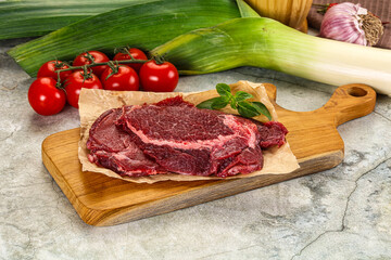Raw beef cheeks cut for cooking