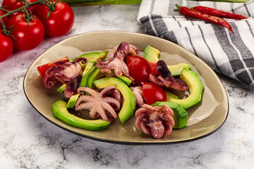 Salad with baby octopus and avocado