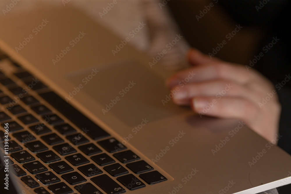 Poster a person is currently typing on their laptop computer, engaging with this electronic device to perfo