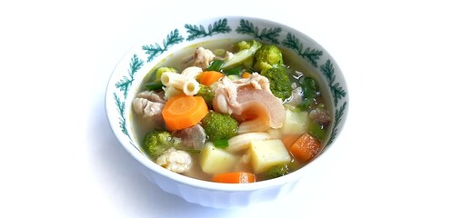 Sayur sop or vegetable with meat soup on the plate. indonesian popular culinary. Healthy food