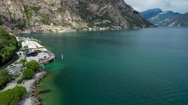 Aerial panoramic view the beach, town of Limone sul Garda and Lake Garda, Italy.
