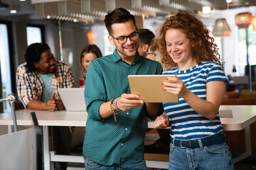 Startup business team on meeting in modern bright office interior and working together