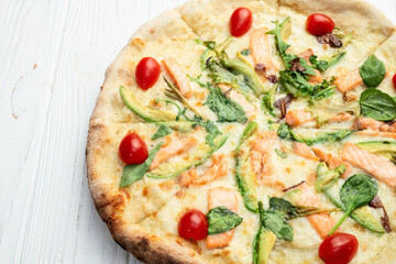 Italian pizza with avocado salmon  tomatoes and mozzarella photography. top view