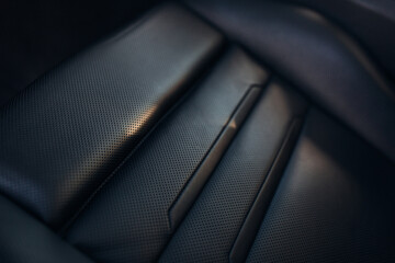 Close up view of modern car leather seat at the luxury interior