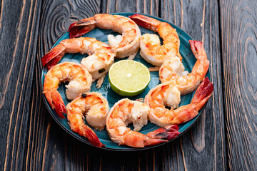 Grilled Tiger shrimps with lime photography . Top view