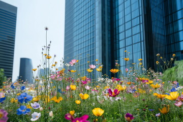 Vibrant flower garden amid modern skyscrapers urban landscape nature photography daytime view serenity in city life