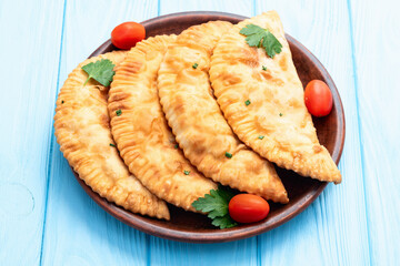 Snack chebureks. Pasties with meat photography . Top view