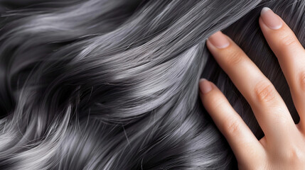 Close-up of textured gray hair strands, showcasing natural aging and elegance. The image highlights the beauty of silver hair, maturity, and timeless sophistication