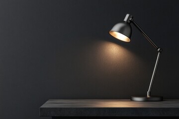A minimalist black desk lamp illuminates a dark room, casting a warm glow on a sleek surface.
