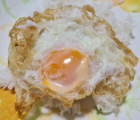 egg on a white plate, Fried egg and rice 