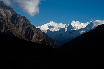 morning sun light illuminates snowclad himalayan peaks