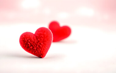 Fototapeta premium Two fuzzy red hearts, a romantic Valentine's Day image