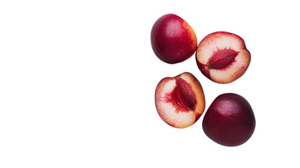 Juicy red plums sliced open revealing vibrant flesh against a bright yellow backdrop creating a warm summer vibe