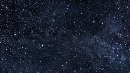 A dark night sky with many stars.