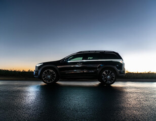 Fototapeta premium Midnight Black SUV with LED Highlights and Smoky Shadow Effects