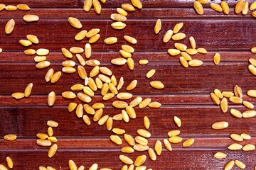wheat grains on a brown background