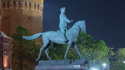 The monument to Marshal Zhukov near the Historical Museum at night timelapse hyperlapse. Moscow, Russia